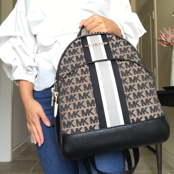 Michael Kors Handbags - NWT RARE MICHAEL KORS Stripe Abbey backpack